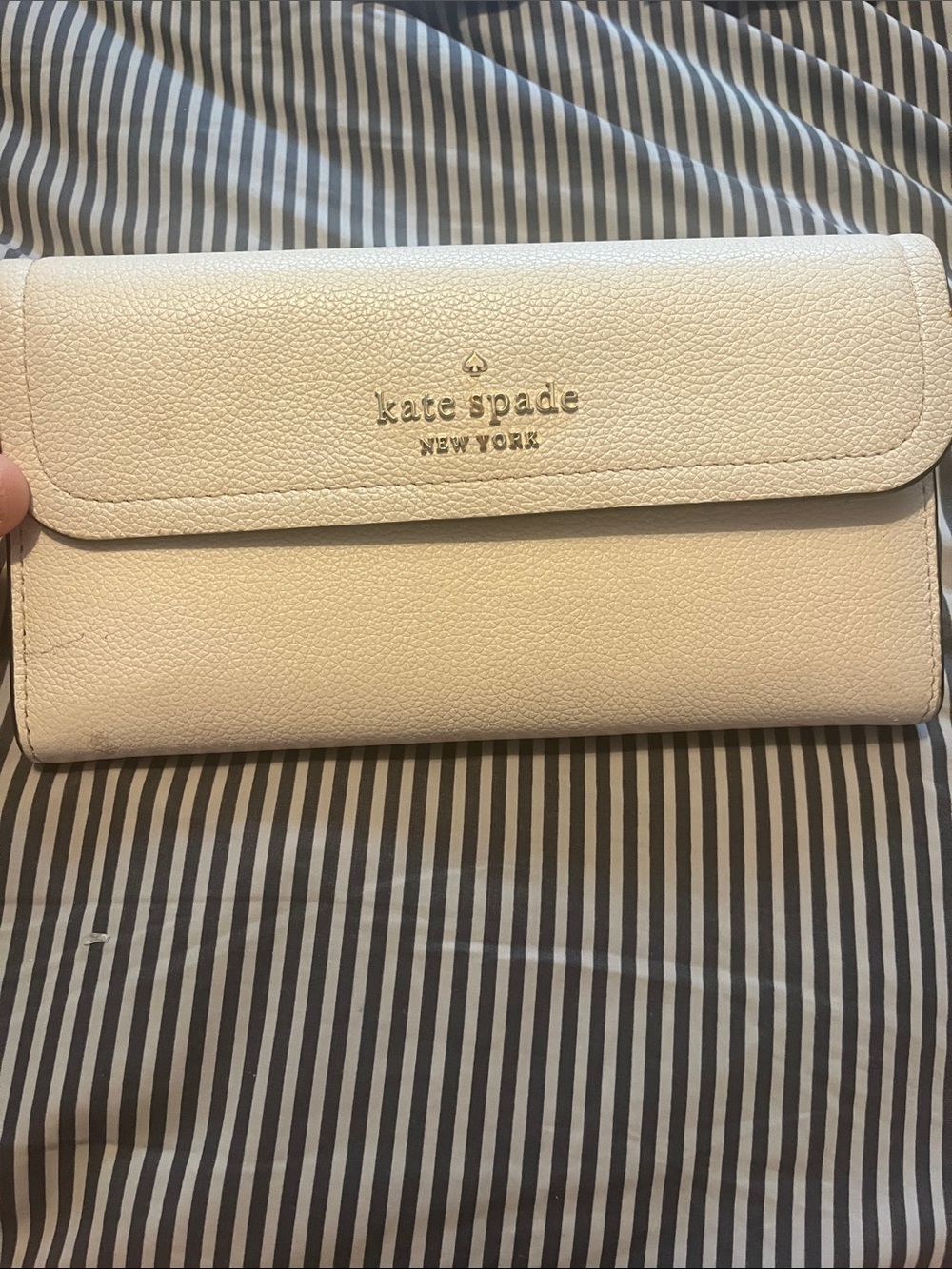 kate spade cream pebbled leather continental wallet